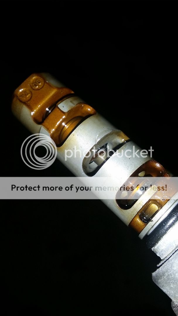 avcs filter screen removal. the one behind intake cam gear NASIOC